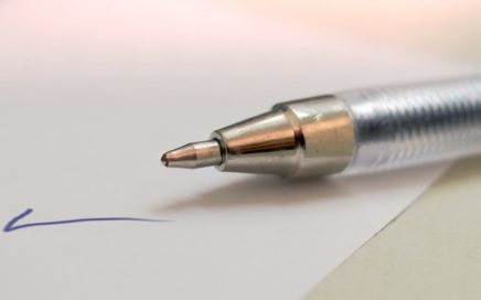 pen with a checkmark