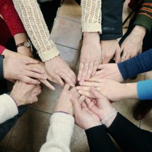 circle of women's hands