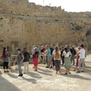 people on a study tour at an archeological site in Israel