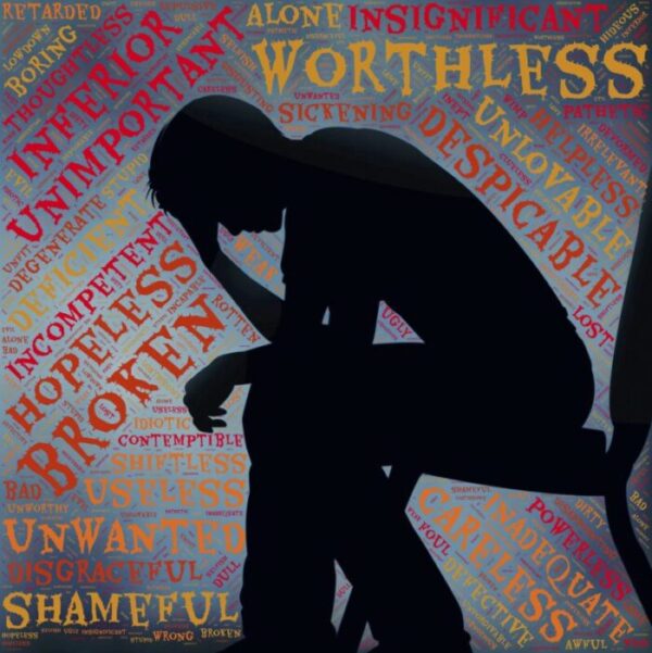person sitting on a chair and thinking, with words surrounding like, like "hopeless" and "broken"